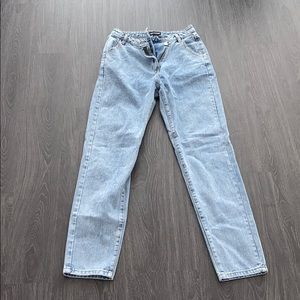Light blue wash asymmetric waistband jeans